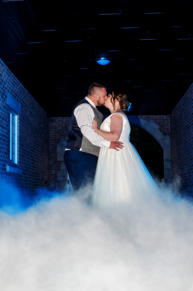 Couple Kissing in cloud with blue light